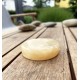 Gelber Onyx als Massagestein mit Kreuz-Symbol